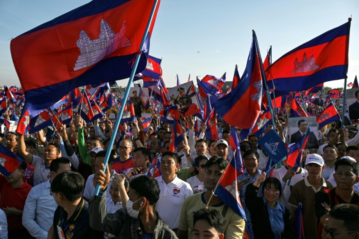 People take part in a solidarity march organised in support of the Cambodian government's actions in its recent border dispute with Thailand, in Phnom Penh on June 18, 2025