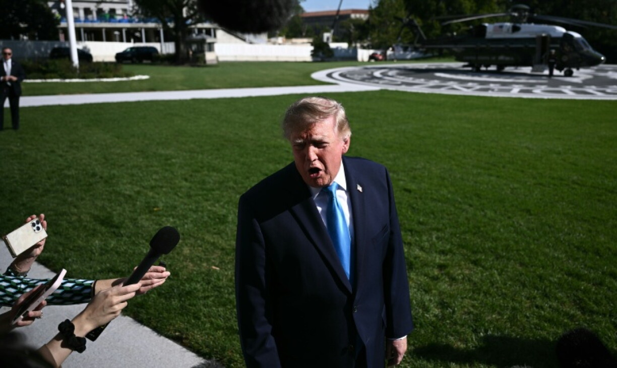 US President Donald Trump speaks to the press before departing from the South Lawn of the White House on October 5, 2026