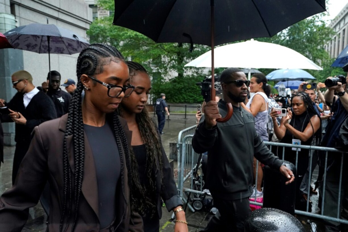 D'Lila Combs (L), and Chance Combs (R), daughters of Sean 'Diddy' Combs, depart federal court as the jury continues deliberations in their father's federal criminal trial