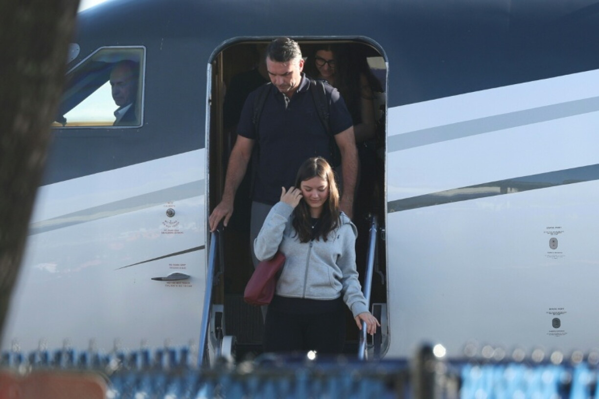 Flavio Bolsonaro steps off a plane after arriving at Opa Locka Executive Airport in Miami, Florida on October 28, 2026