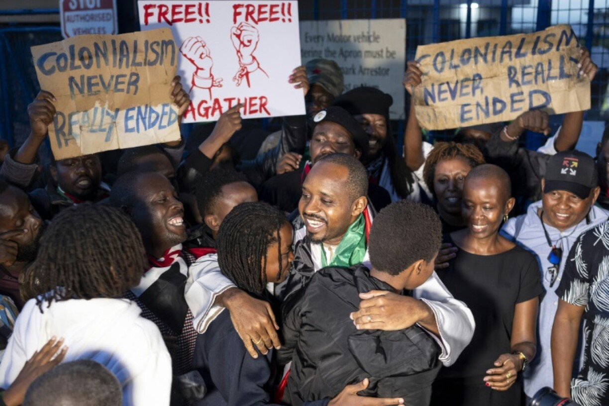 Relatives welcome Mwangi home following his May 19 detention in Tanzania