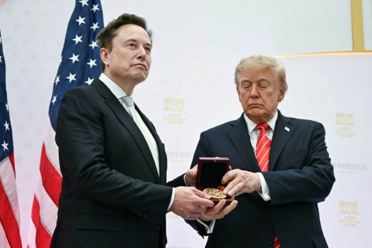 US President Donald Trump presents the National Medal of Science to Elon Musk