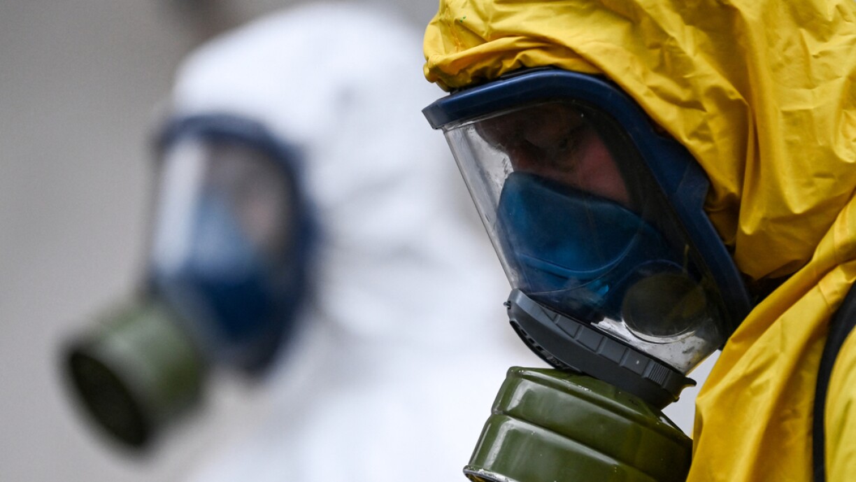 Servicemen of Russia's Emergencies Ministry wearing protective gear disinfect Moscow's Leningradsky railway station on October 19, 2021, amid the ongoing coronavirus disease pandemic. Russia has officially recorded 1,015 coronavirus deaths on October 19, up from 998 the previous day, and 33,740 new Covid-19 cases, down from 34,325.