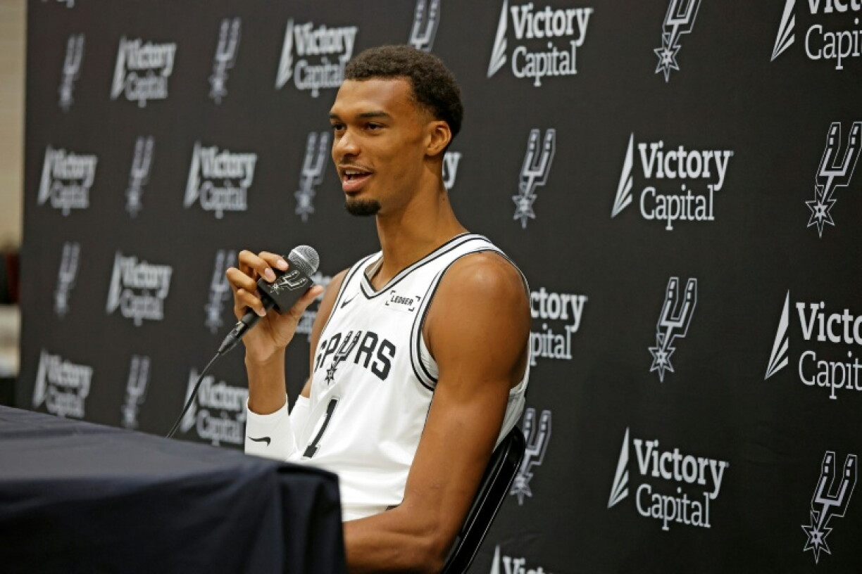 Victor Wembanyama talks to reporters at the San Antonio Spurs media day