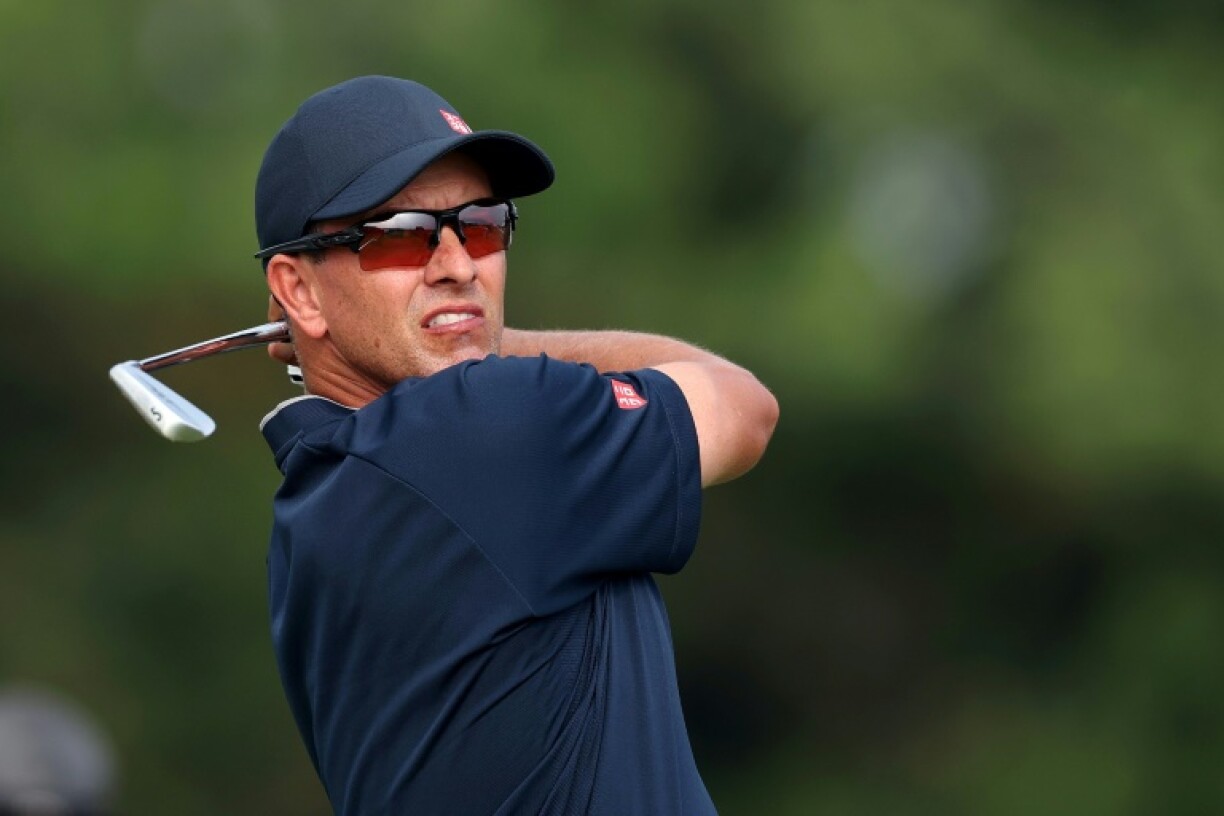 Former Masters champion Adam Scott of Australia fired back-to-back rounds of 70 to stand fourth on level par 140 after 36 holes at the US Open at Oakmont