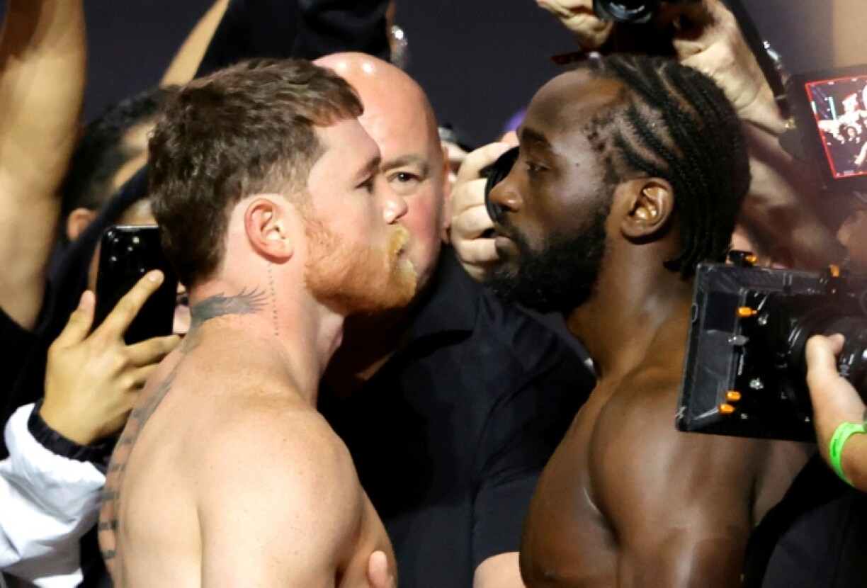 Saul 'Canelo' Alvarez and Terence Crawford face off during a ceremonial weigh-in before their super middleweight world title fight in Las Vegas