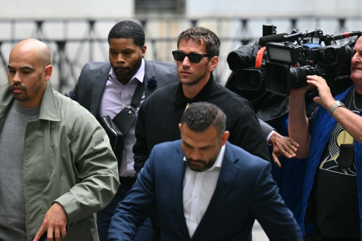 Alex Fine (C), Casandra Ventura's husband, was in attendance as she was cross-examined by attorneys for Sean Combs