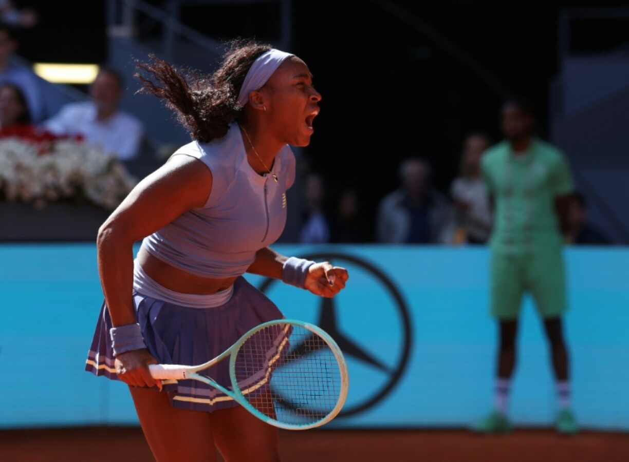 USA's Coco Gauff celebrates after defeating Poland's Iga Swiatek at the Caja Magica in Madrid