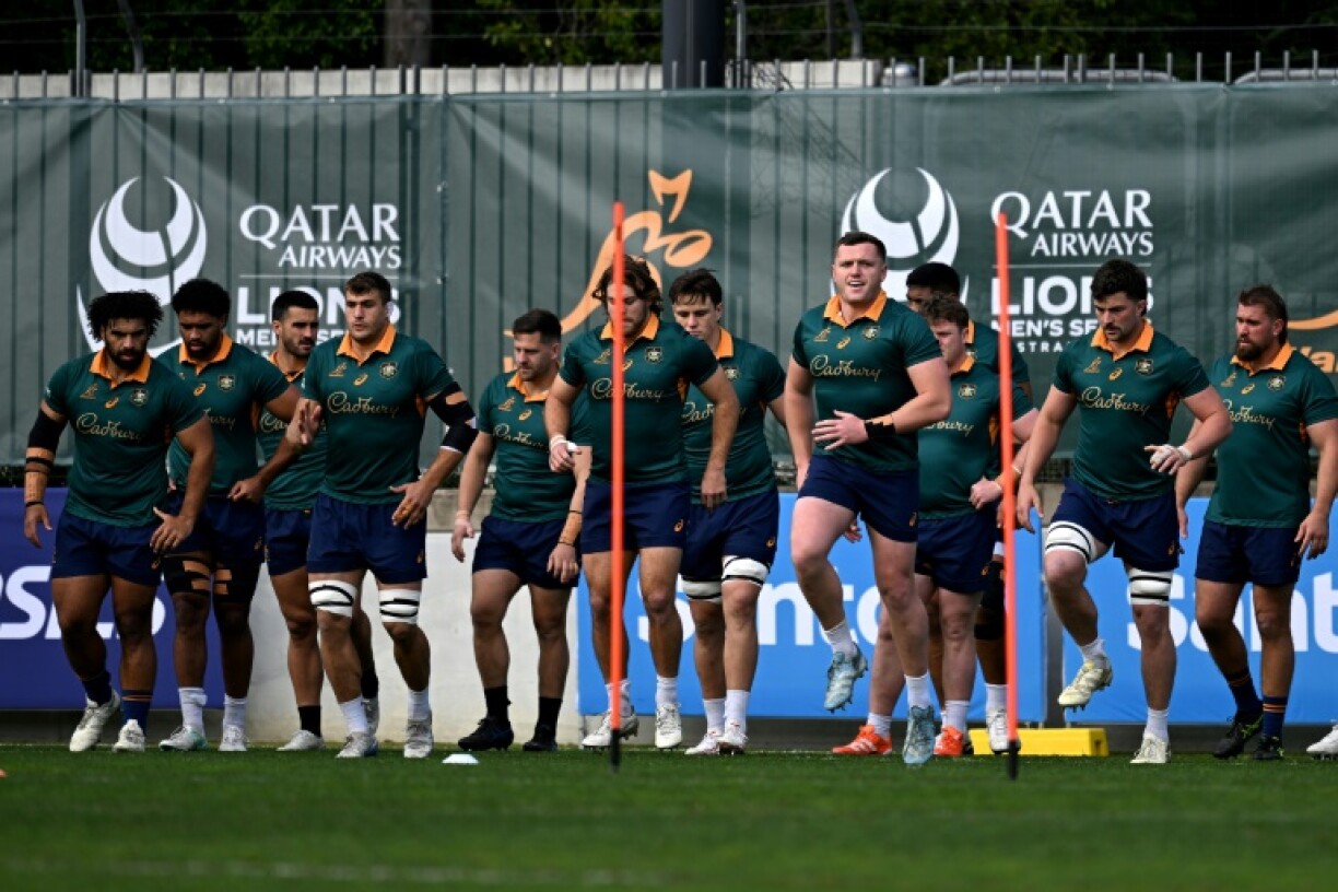 Australia's team warm up during a training session in Sydney