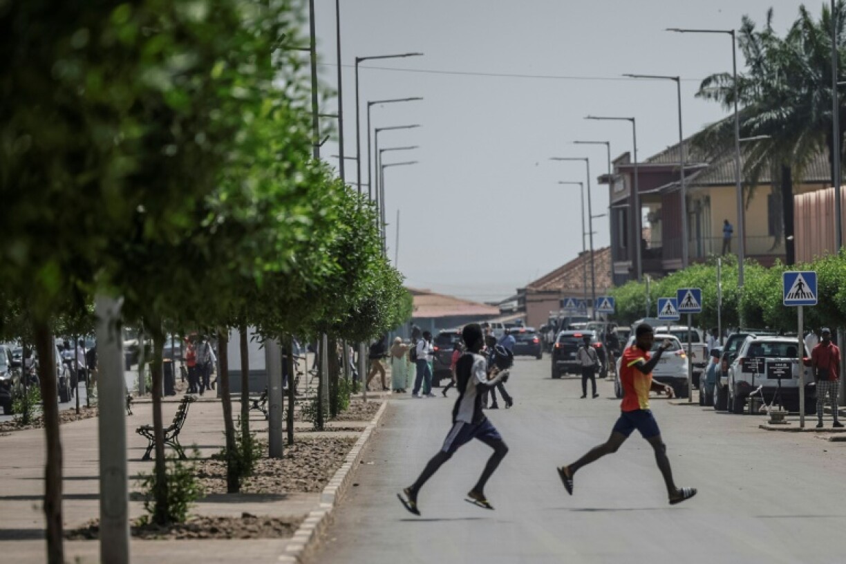 Men fled the scene as gunfire rang out near the presidential palace in Bissau