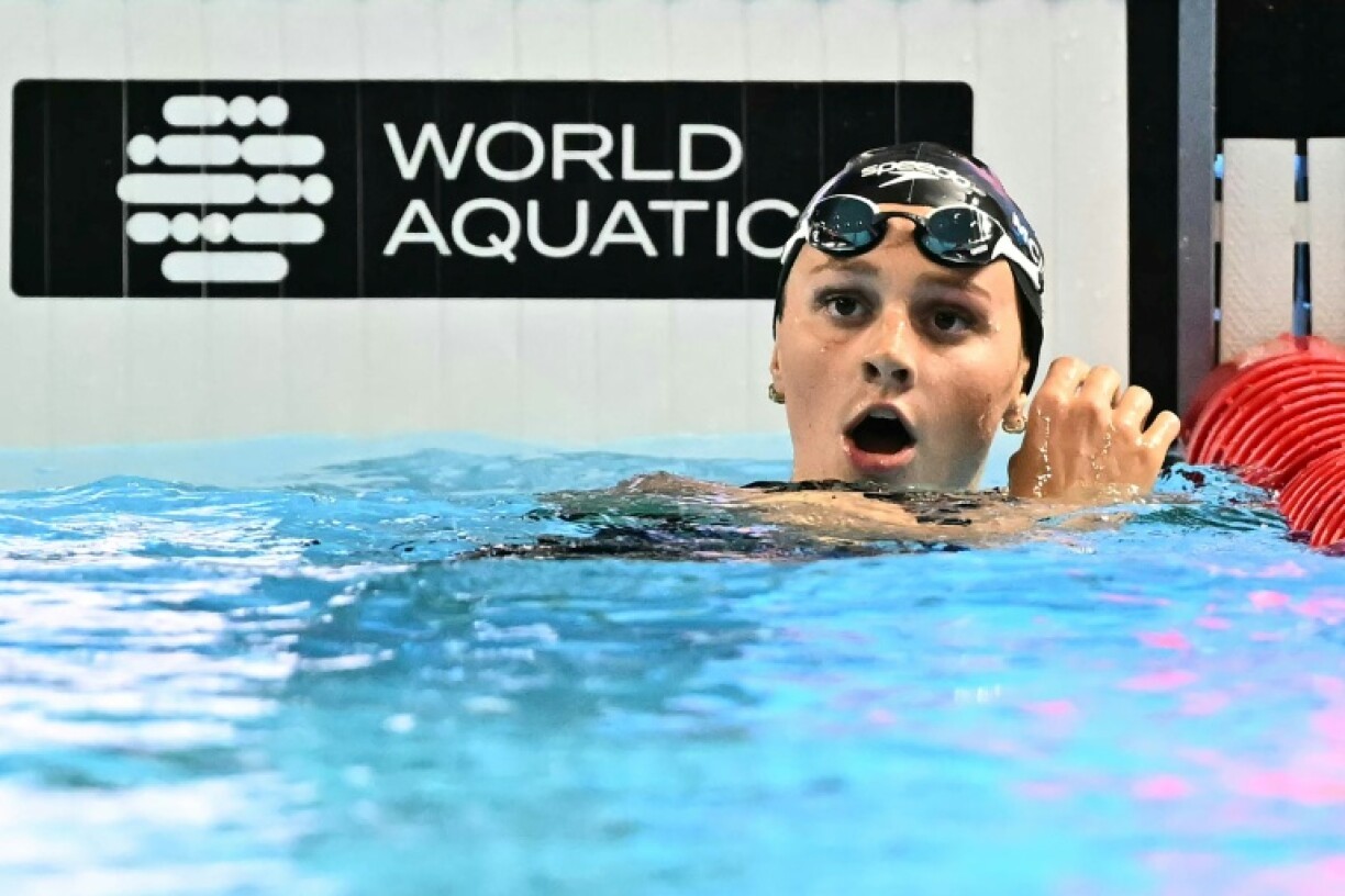 Canada's Summer Mcintosh reacts after winning the final of the women's 400m freestyle swimming event during the 2025 World Aquatics Championships in Singapore