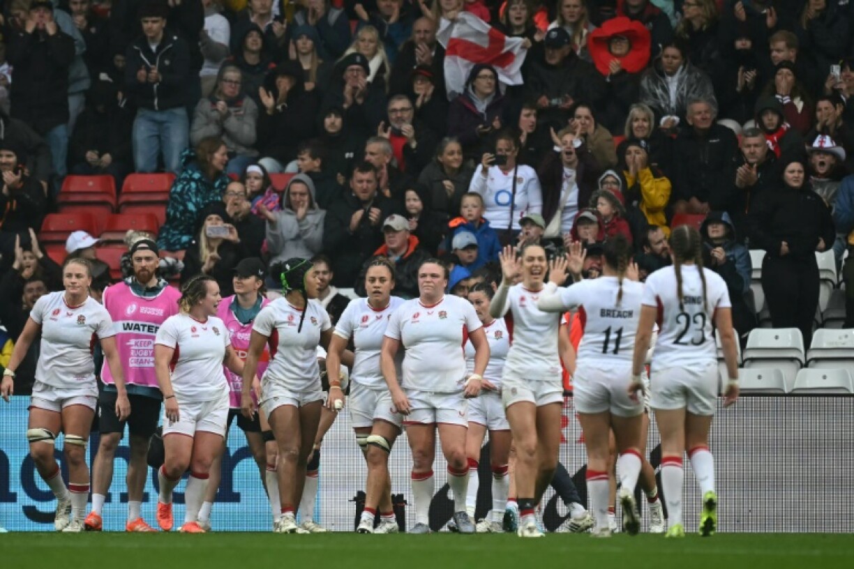 England players celebrate their 40-8 Women's Rugby World Cup quarter-final win over Scotland in Bristol