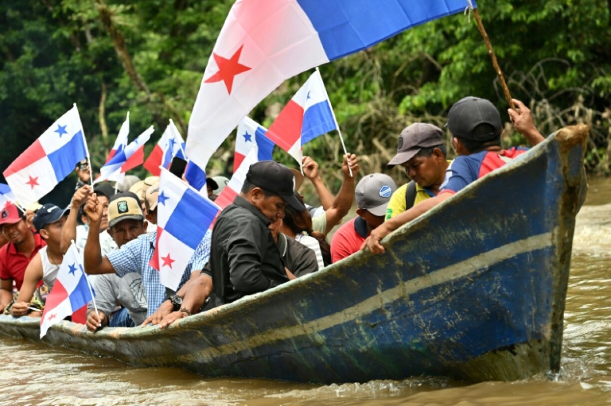 Villagers protest against the planned dam on the Rio Indio