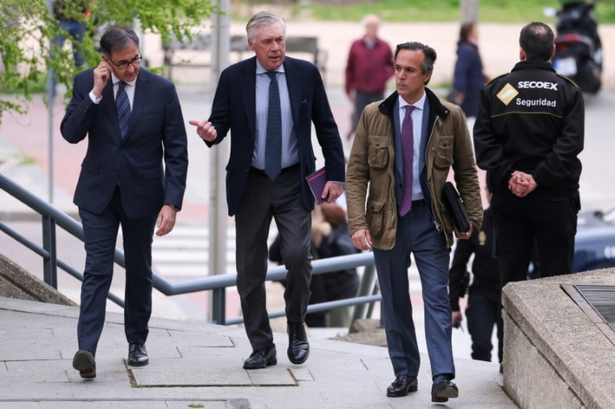 Real Madrid coach Italian Carlo Ancelotti, seen here arriving at his trial in Madrid, denied in court having intentionally committed tax fraud