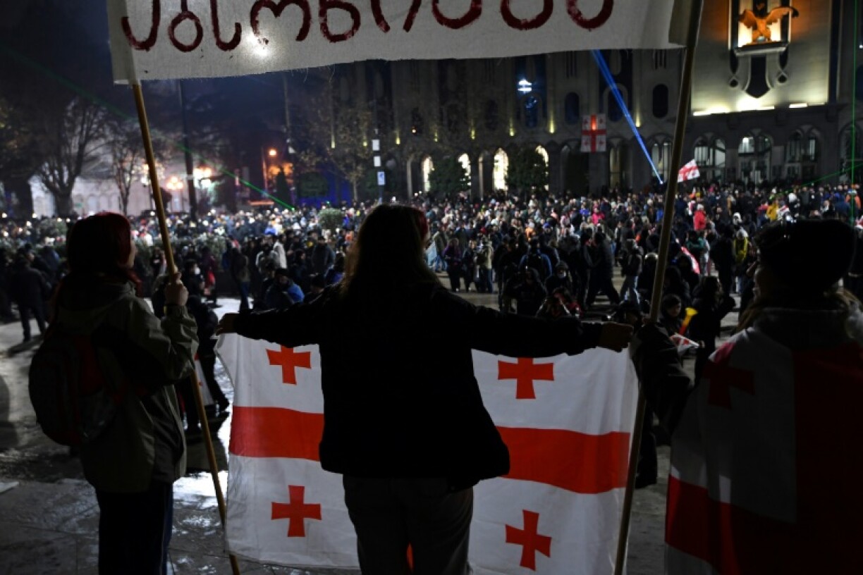 Several thousand people blocked the street outside parliament for a ninth consecutive night Friday
