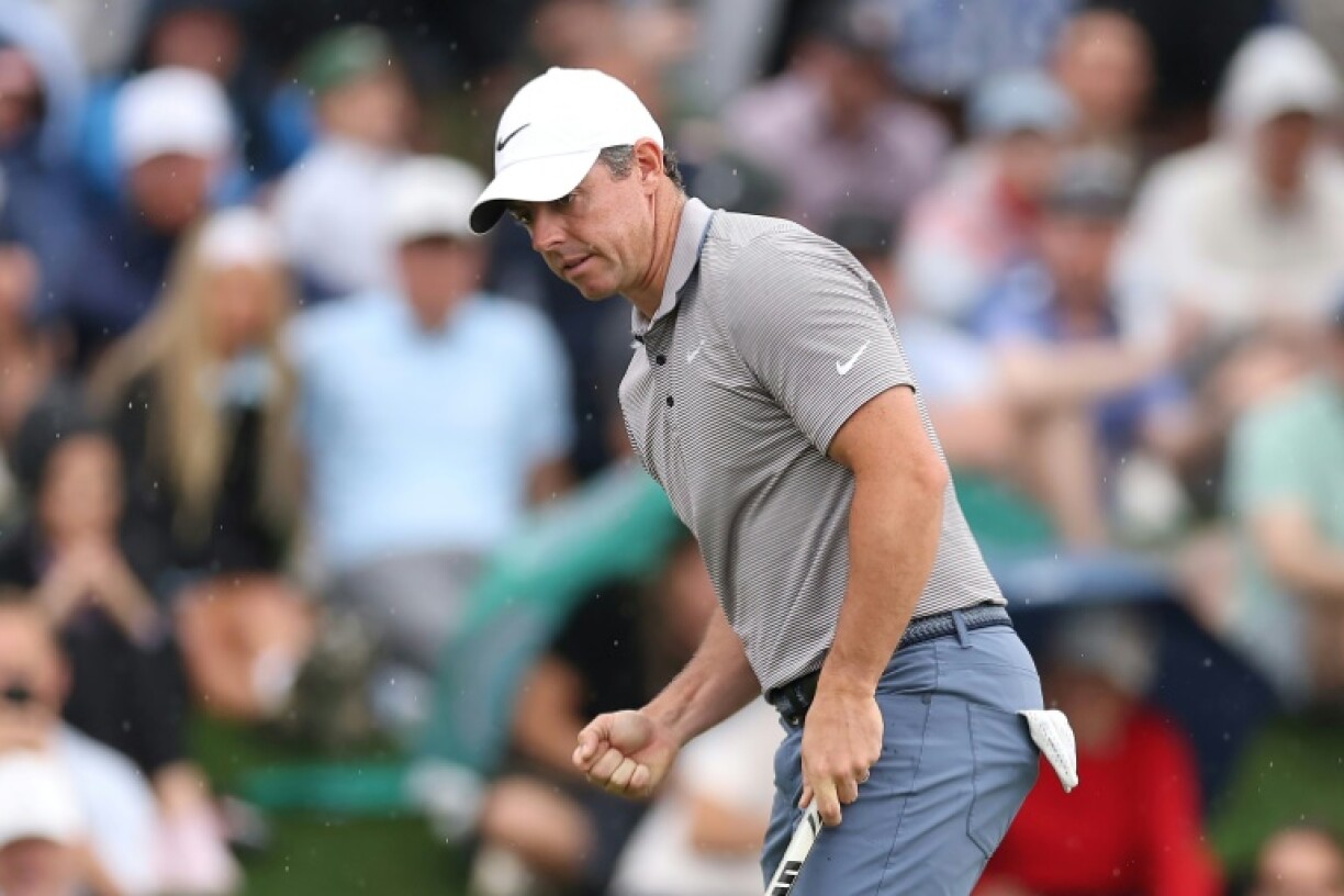 Rory McIlroy of Northern Ireland pumped his right fist after making a go-ahead birdie putt at the 11th hole during the final round of the PGA Tour Players Championship