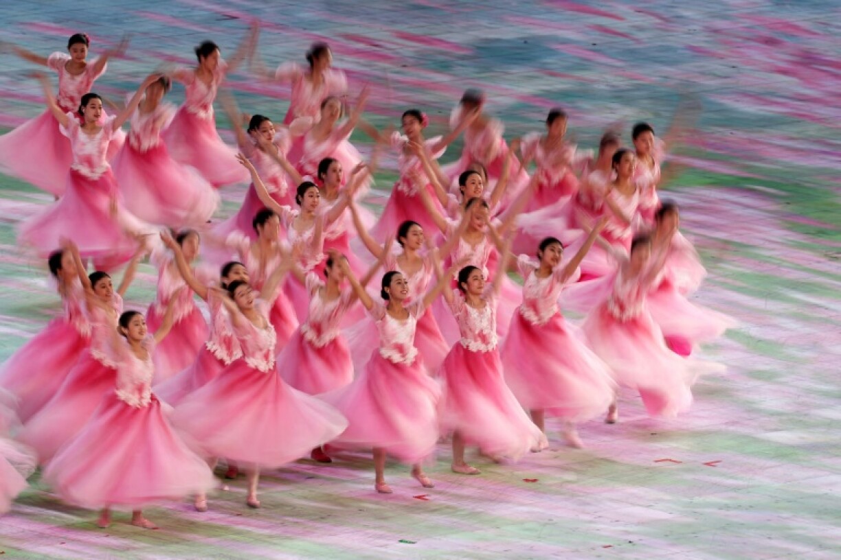 Chinese security officials said Tuesday they had implicated three US 'secret agents' in mass cyberattacks during the Asian Winter Games