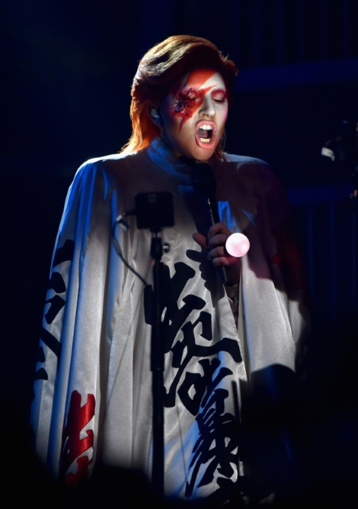 Singer Lady Gaga performs a tribute to David Bowie during the 2016 Grammy Awards