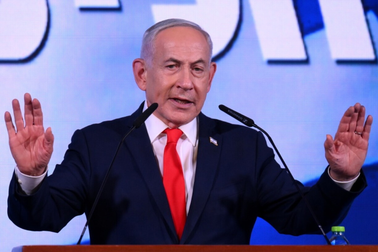 Israel's Prime Minister Benjamin Netanyahu addresses his supporters at the election night rally after the first exit polls were announced, in Jerusalem on early October 28, 2026, during Israel's legislative elections