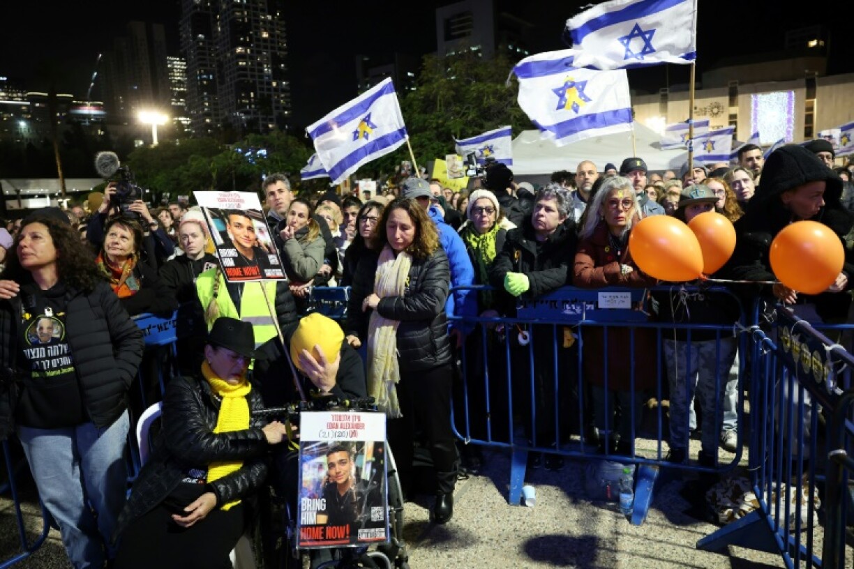 Mourners in Tel Aviv observe a moment of silence in memory of four dead hostages whose bodies were handed over to Israel by Hamas on Thursday