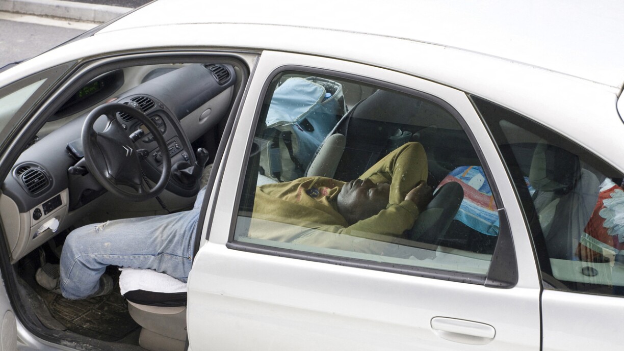 This is a photo of a person sleeping in a car during their break in Bordeaux, taken on 22 April 2014. This photo is therefore not related to the stories mentioned in this article.