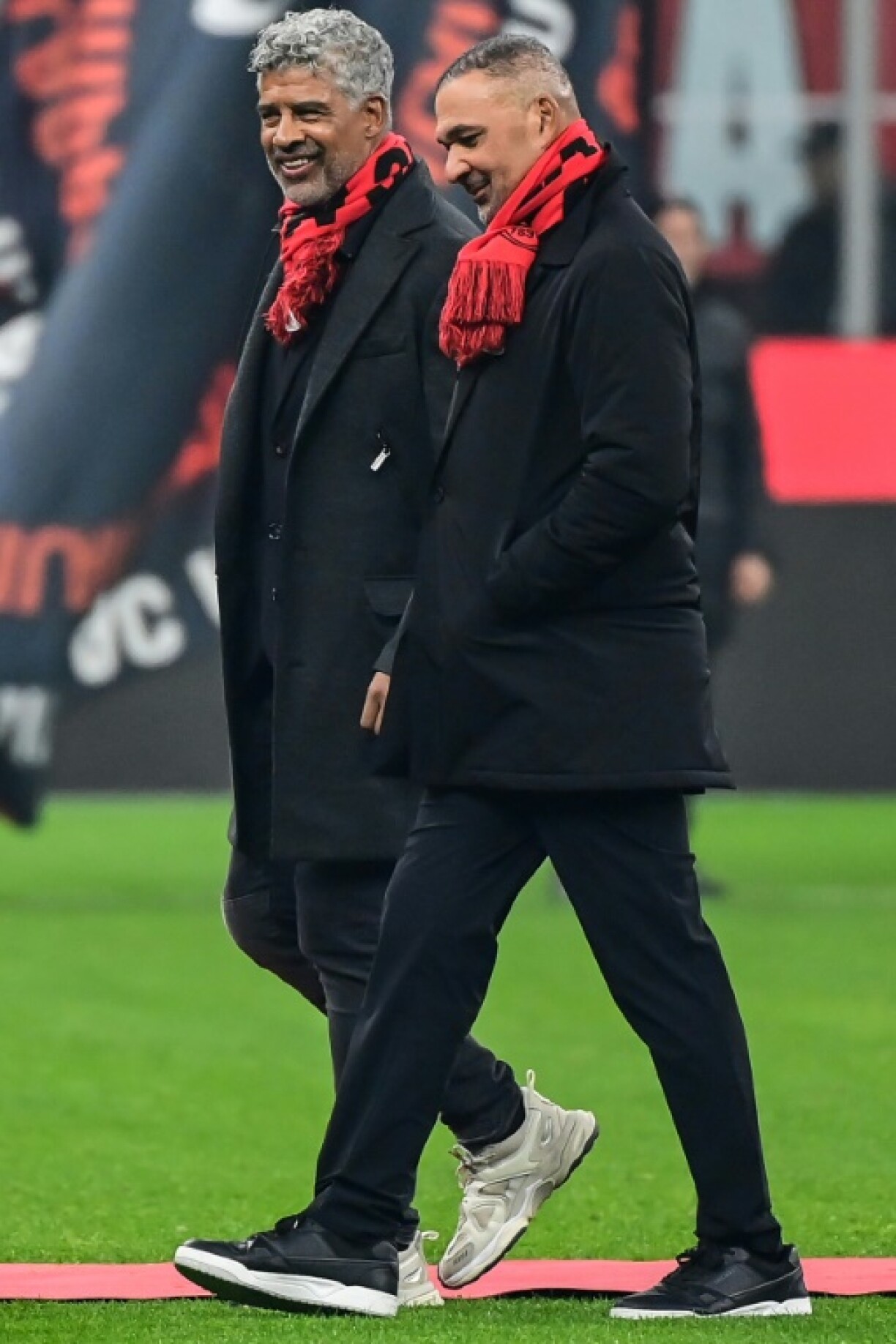 Ruud Gullit (R) and Frank Rijkaard were among those who celebrated AC Milan's 125th birthday