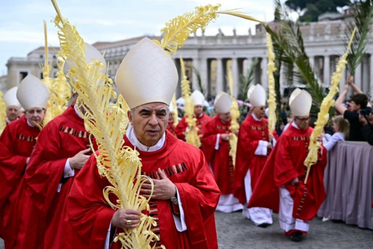 Convicted Italian cardinal Angelo Becciu at a Palm Sunday procession at the Vatican