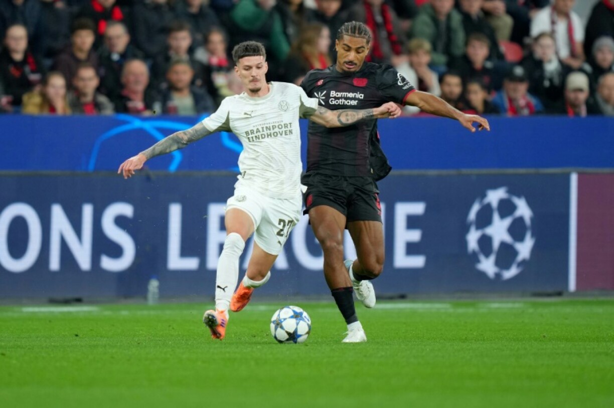 Bayer Leverkusen's Loic Bade vies for the ball.