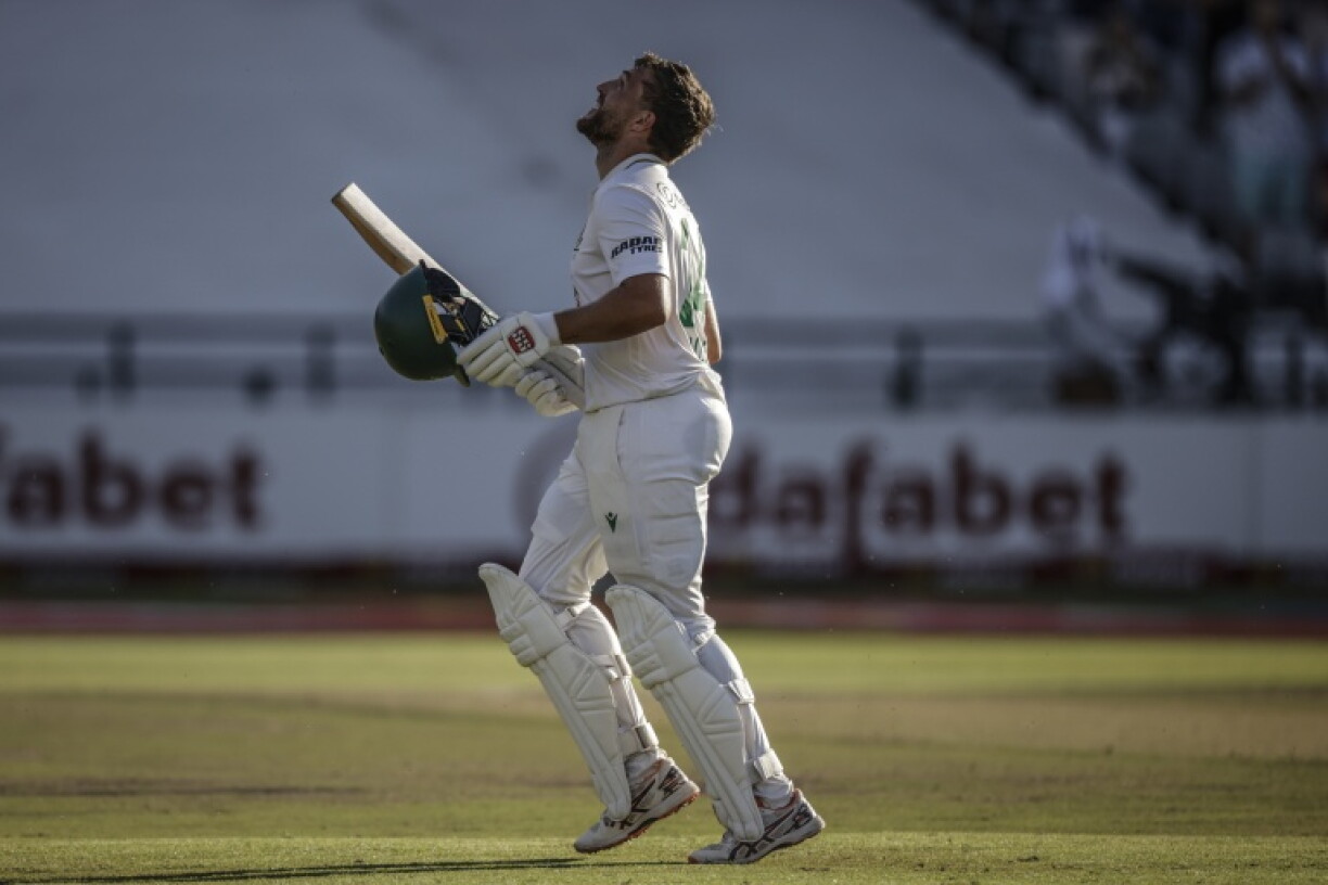 Wiaan Mulder celebrates his century against Australia.