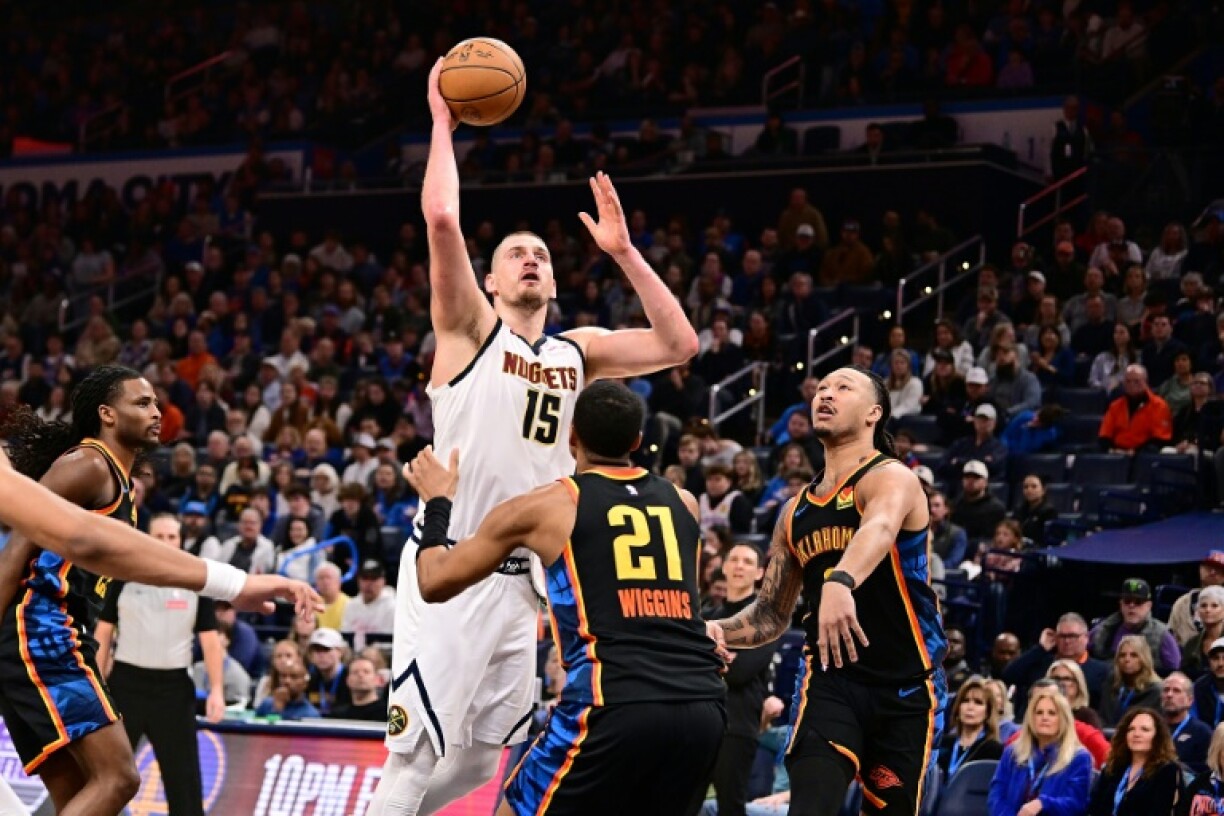 Nikola Jokic attempts a shot in Denver's victory over the Oklahoma City Thunder