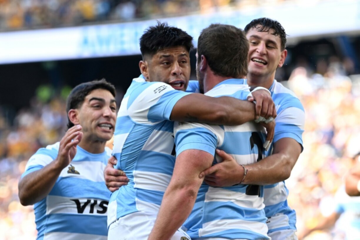 Argentina players celebrate a try by skipper Julian Montoya against Australia in Sydney