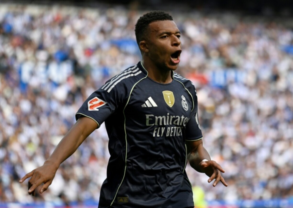 Real Madrid's French forward Kylian Mbappe celebrates scoring his team's first goal against Real Sociedad