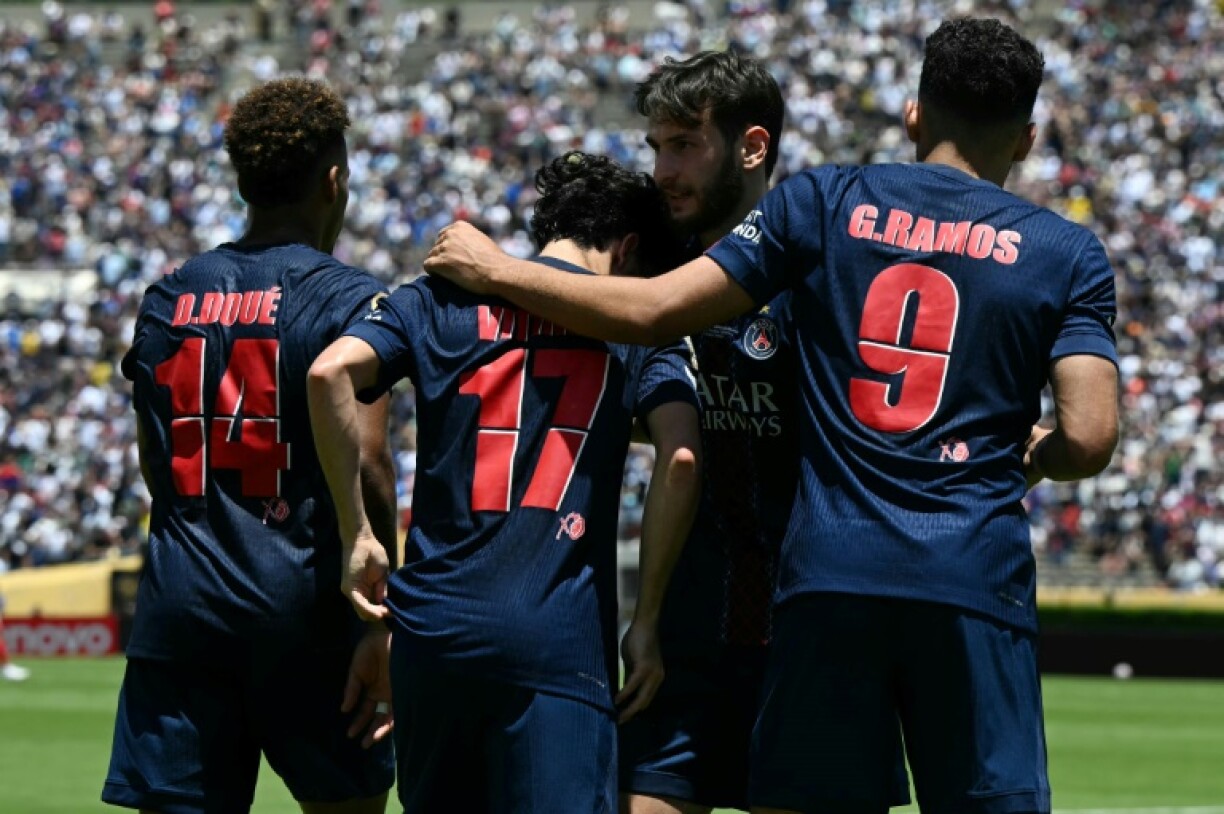 Paris Saint-Germain players celebrate Vitinha's goal during their Club World Cup win over Atletico Madrid