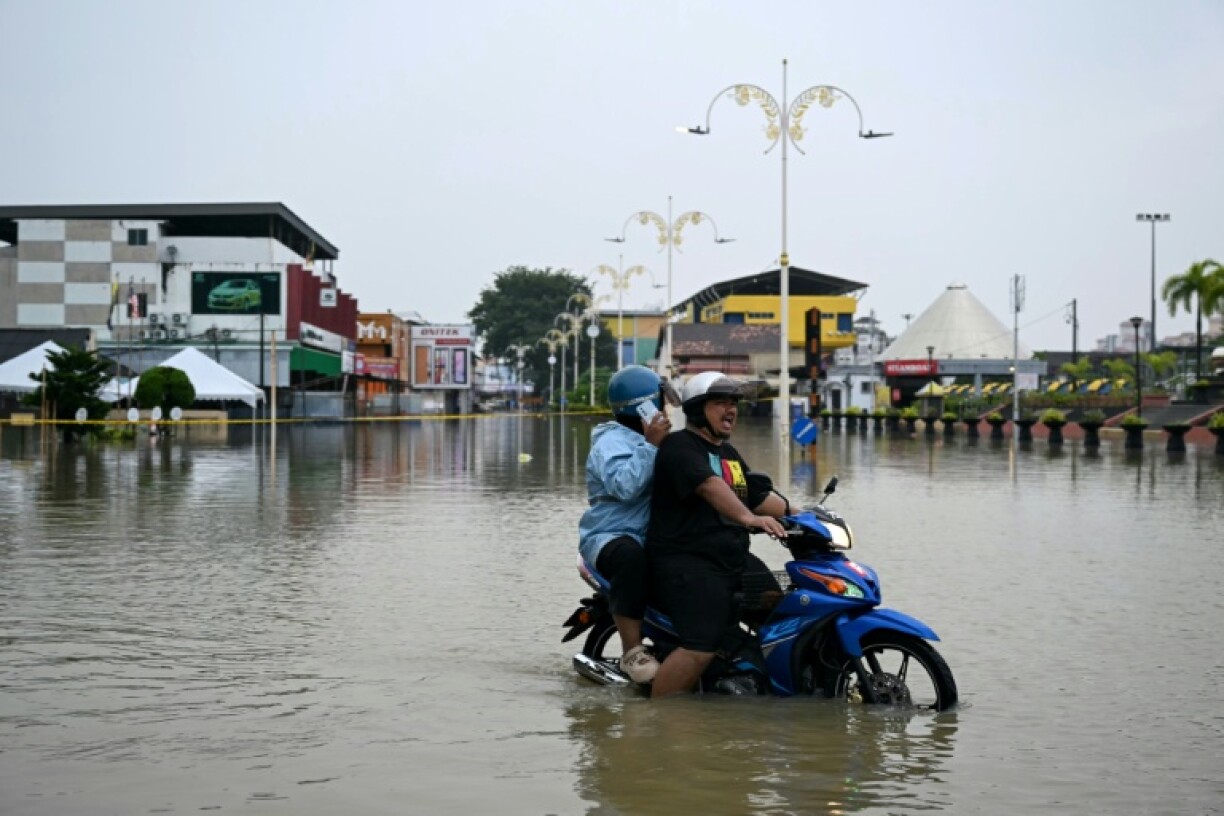 Floods have hit eight states in Malaysia, with more rain forecast