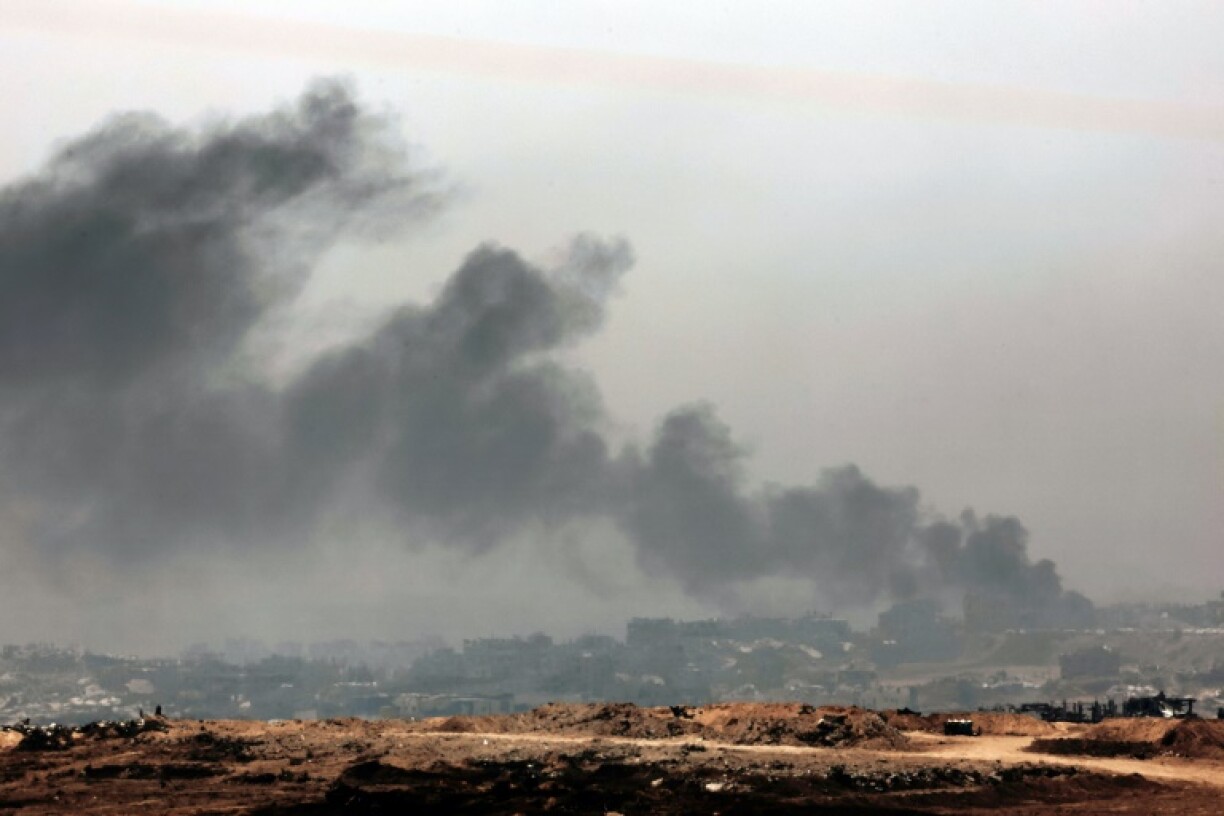 Smoke billows over the Gaza Strip after the Israeli military announced the start of an intensified operation in the territory