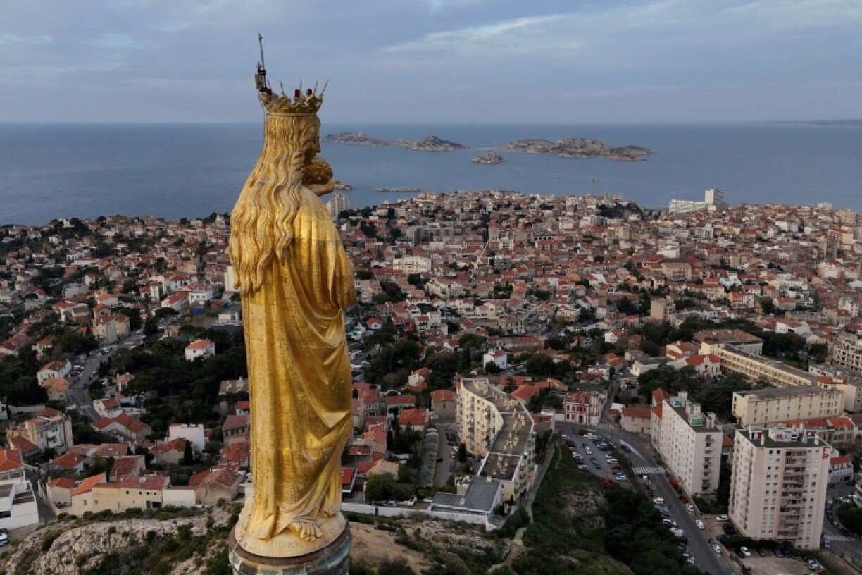 For more than a century the statue has watched over Marseille and its seafarers