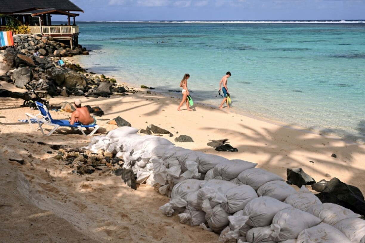 The Cook Islands' pistine lagoons lure wealthy tourists that prop-up the economy, fridges are stocked with fish plucked from vibrant reefs, and local myths teach children to revere the sea