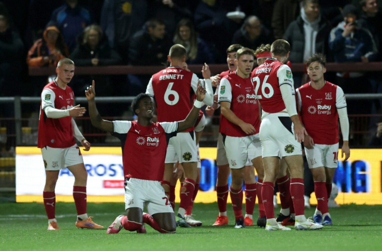 Fleetwood striker Aaron Loupalo-Bi celebrates scoring against Arsenal