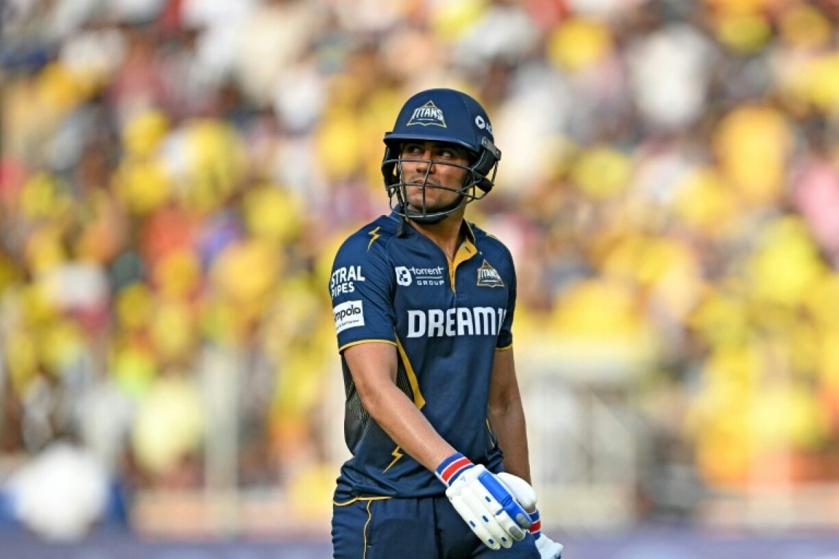 Gujarat Titans' captain Shubman Gill walks back after his dismissal