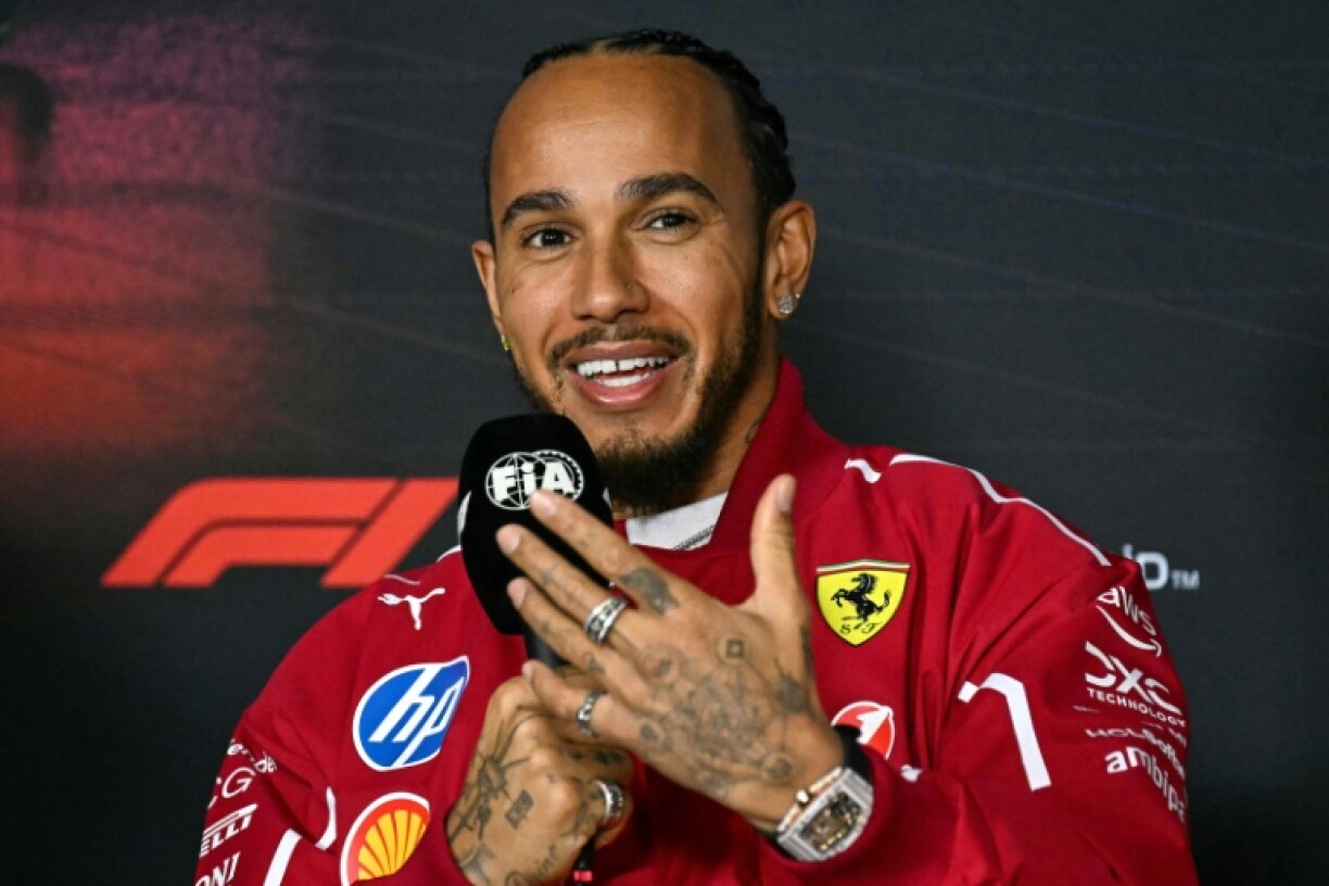 Ferrari's Lewis Hamilton attends a press conference in Melbourne