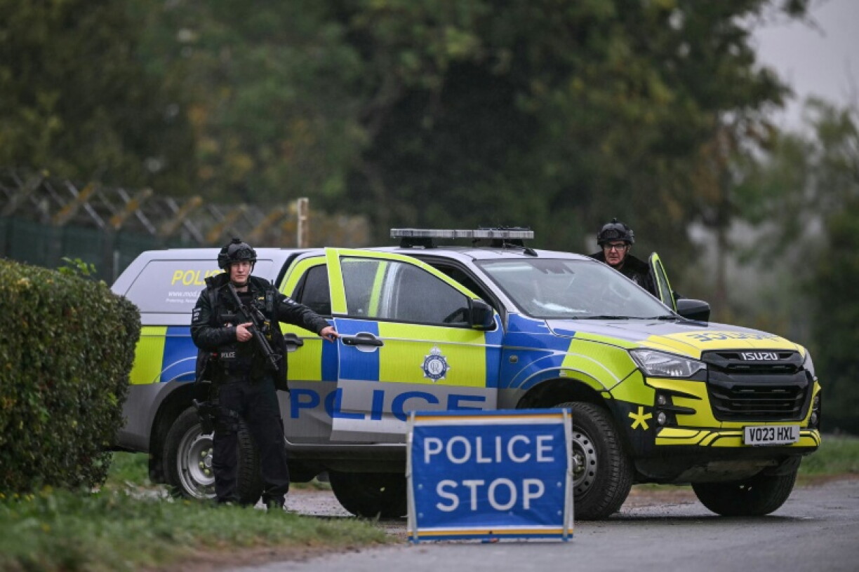 Armed police mounted a roadblock outside RAF Fairford base, southwest England