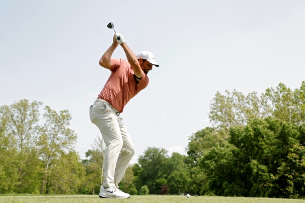 Scottie Scheffler's late birdie spree left the world number one on top of the leaderboard at the Memorial Tournament in Ohio