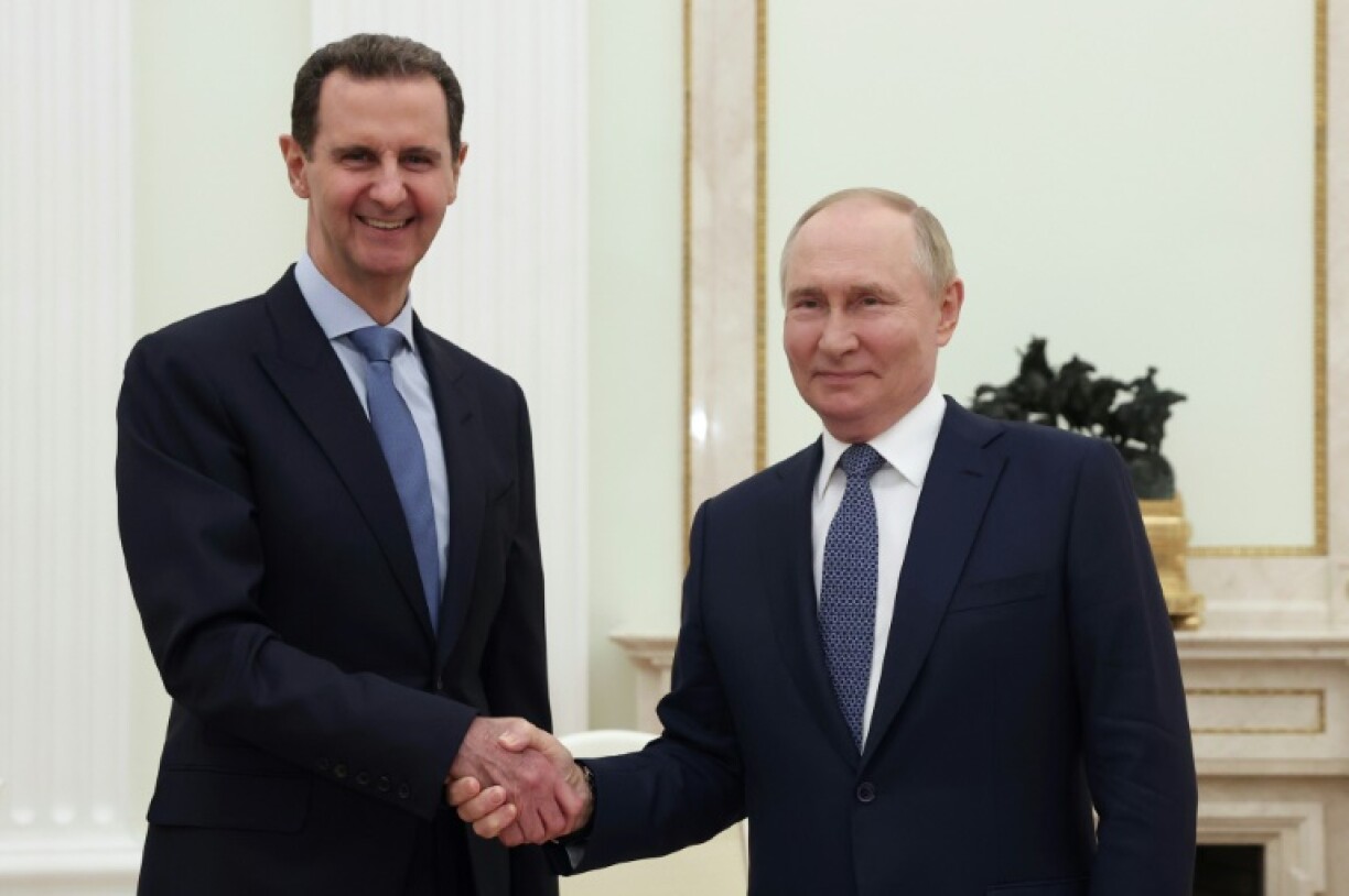 While in power, Bashar al-Assad (L) was one of Russian President Vladimir Putin's (R) closest allies