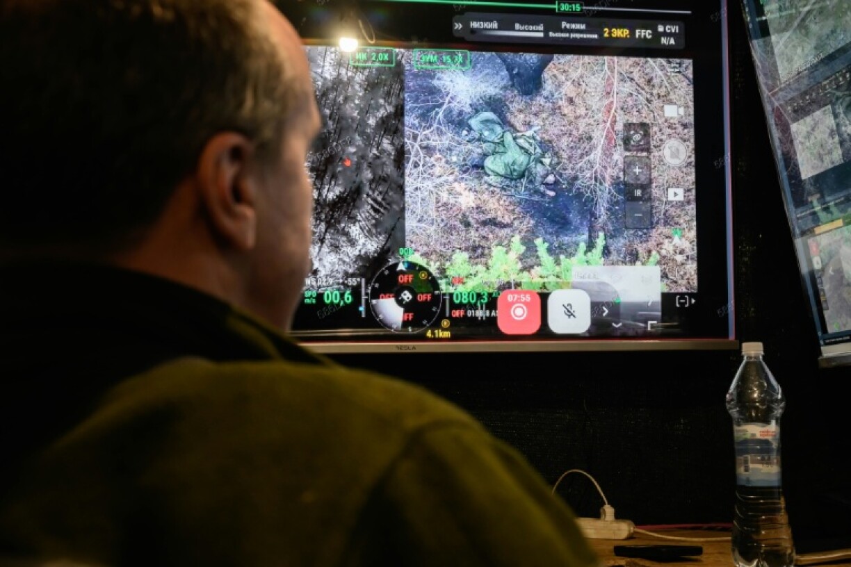 Ukrainian command centres relay footage from drones buzzing over the ruined city of Kupiansk