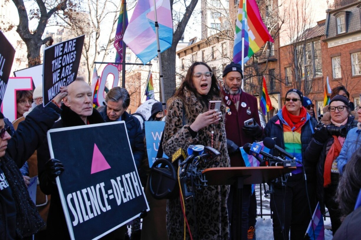 Demonstrators rally against the removal of references to transgender and queer people on the website for the national monument marking the Stonewall riots