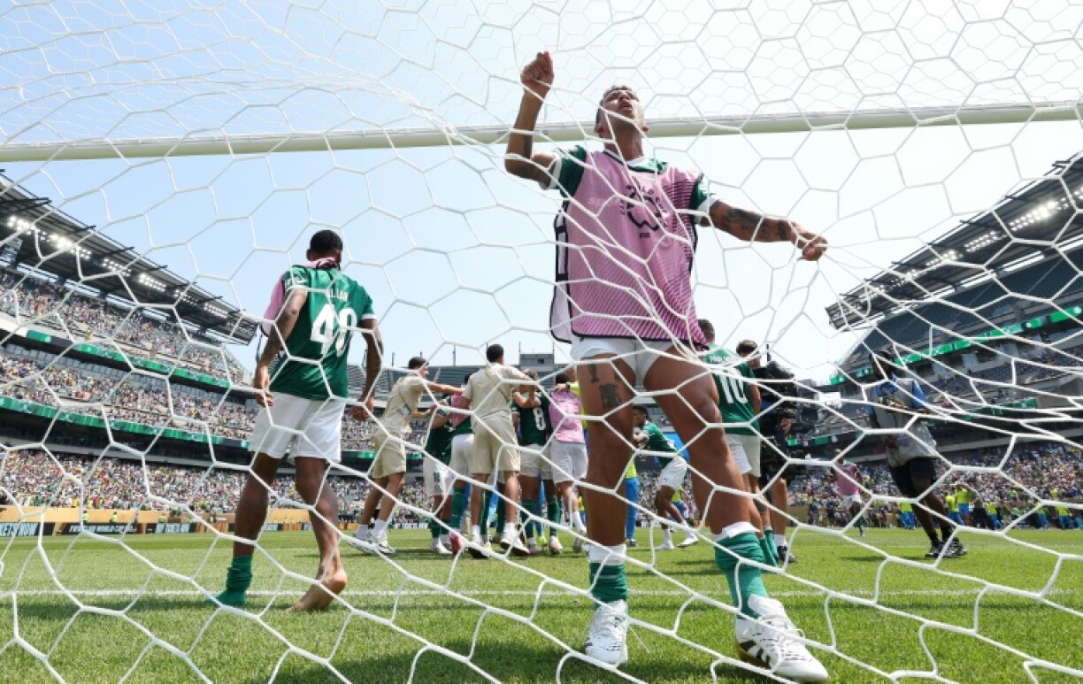Palmeiras players celebrate after beating Brazilian rivals Botafogo in the last 16 at the Club World Cup