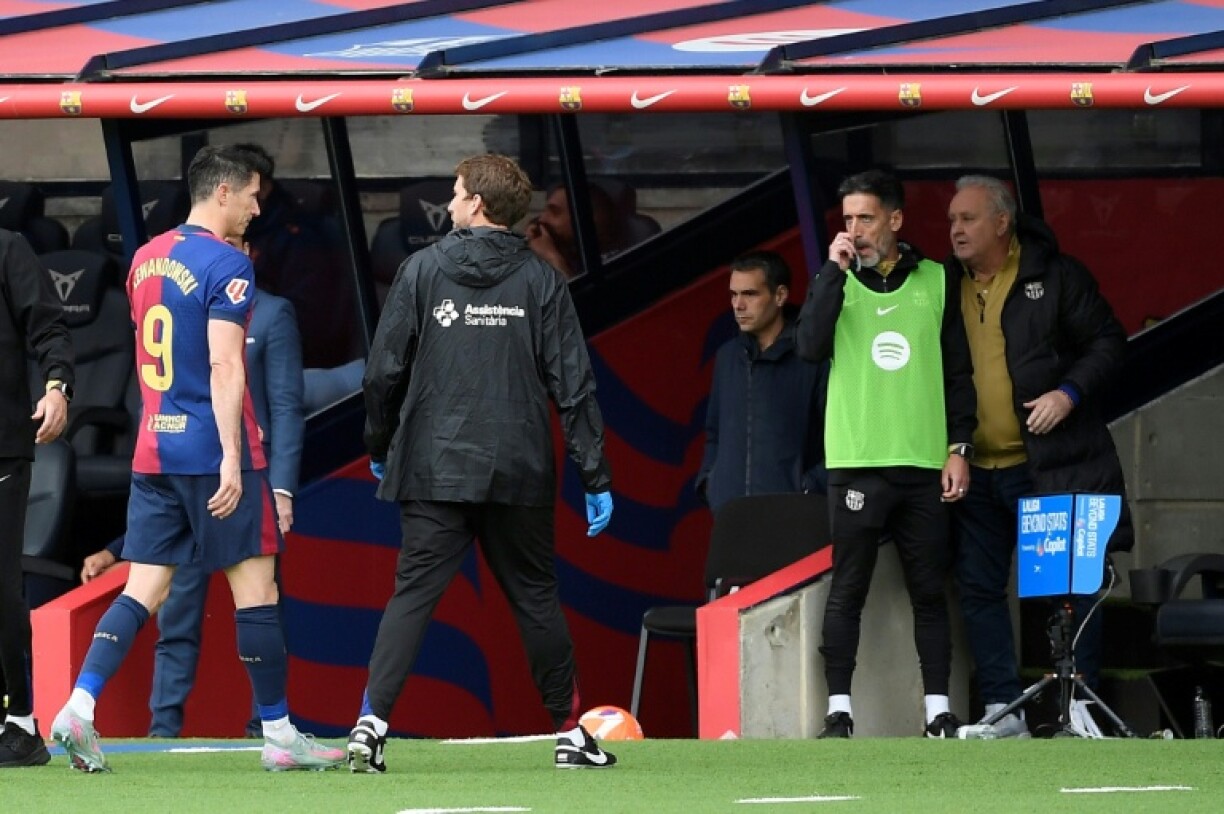 Barcelona's Polish forward Robert Lewandowski went off hurt against Celta Vigo on Saturday
