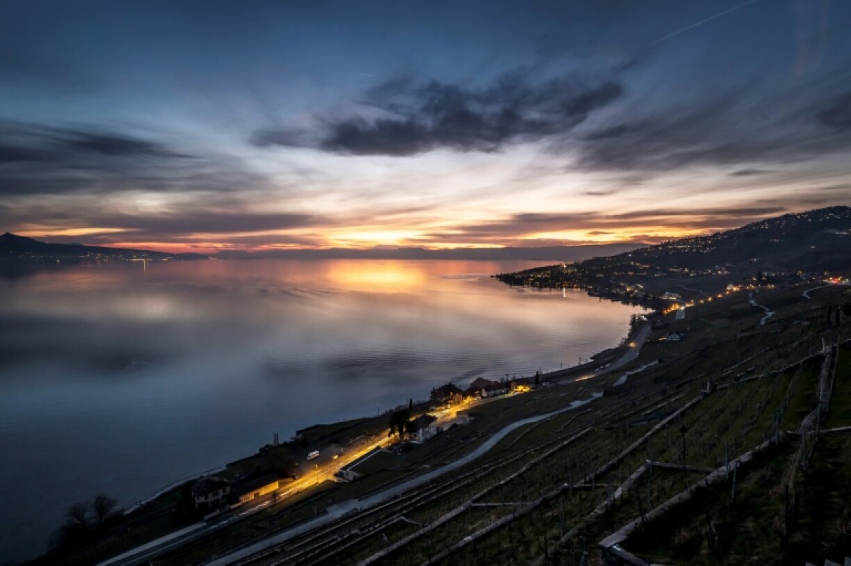 Lake Geneva after sunset above the vineyard terraces of Lavaux