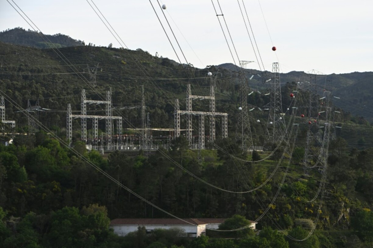 High-voltage pylons carry electricity from Spain to Portugal
