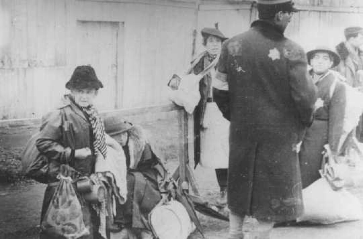 Jewish deportees from Luxembourg, Austria, and Czechoslovakia during deportation from the Lodz ghetto to the Chelmno killing center. Lodz, Poland, 1942.